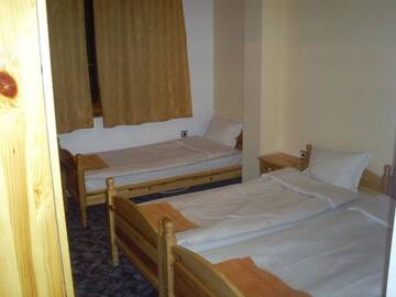 Фото номера Трехместный номер Отель Family Hotel Byalata Kashta г. Баните 3